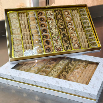 بقلاوة متوسطة (علبة بيضاء) ٥٠٠ غرام ± ٣٪